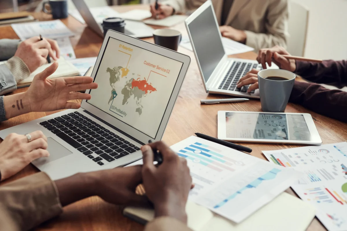 Employees assess a company’s global profitability.