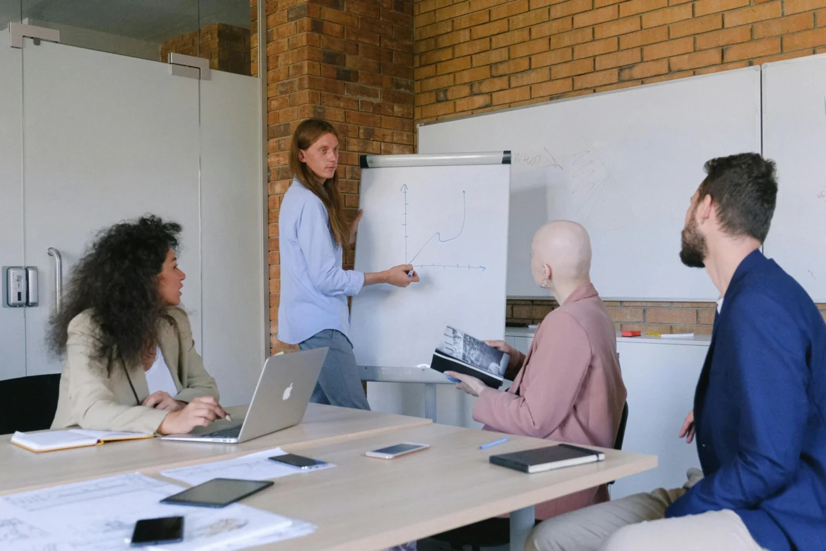 Four people meeting in an office.